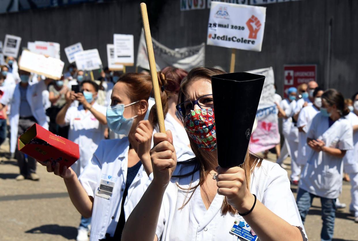 Une manifestation de soignants à Paris, le 28 mai 2020. - ALAIN JOCARD / AFP