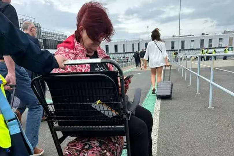 Liz Weir was stranded on the tarmac at Belfast International Airport with two other customers using the special assistance service