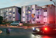 <p>Apartment buildings are shown after a tornado torn roofs off and windows blown out after a tornado caused extensive damage to a Gatineau, Quebec neighbourhood forcing hundreds of families to evacuate their homes on Friday, September 21, 2018. A tornado damaged cars in Gatineau, Que., and houses in a community west of Ottawa on Friday afternoon as much of southern Ontario saw severe thunderstorms and high wind gusts, Environment Canada said. (Photo from Fred Chartrand/The Canadian Press) </p>