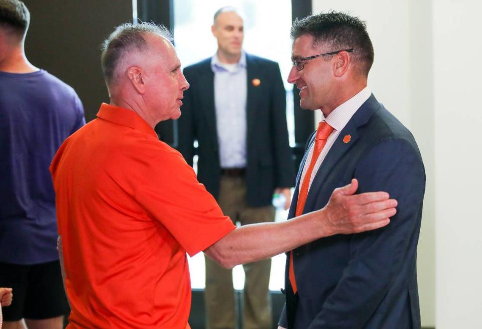Clemson head baseball coach Erik Bakich speaks former Clemson head baseball coach Jack Leggett during the introductory press conference at Doug Kingsmore Stadium, June 16th, 2022.