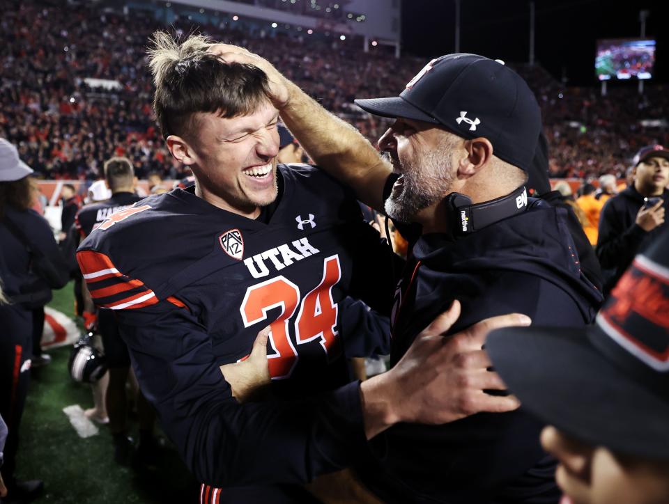 Utah punter Jack Bouwmeester (34) celebrates the Utes’ win over USC at Rice-Eccles Stadium in Salt Lake City on Saturday, Oct. 15, 2022. The Utah punter began the 2023 season with a bang in victory over Florida. | Scott G Winterton, Deseret News