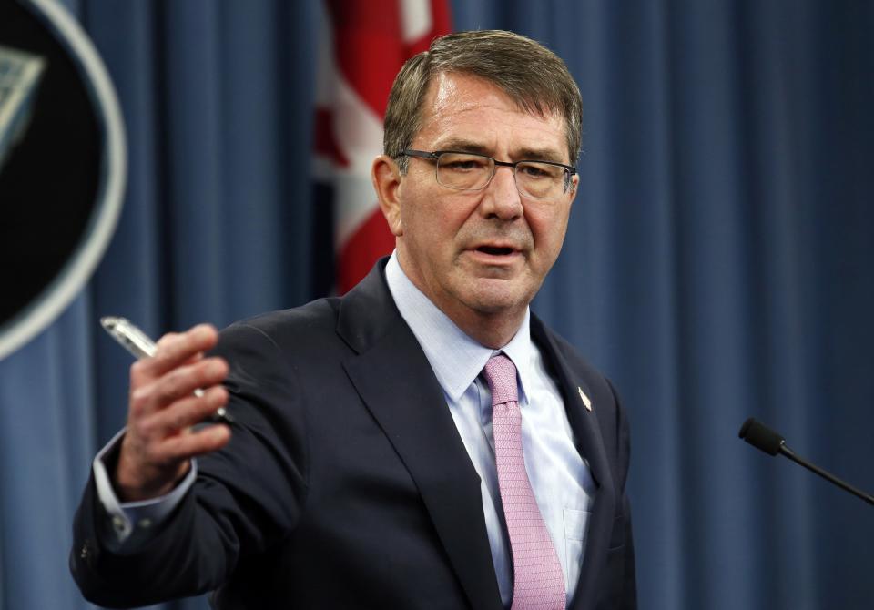 U.S. Defense Secretary Ash Carter speaks at a joint news conference with British Defense Secretary Michael Fallon after their meeting at the Pentagon in Washington March 11, 2015. REUTERS/Yuri Gripas (UNITED STATES - Tags: MILITARY POLITICS)