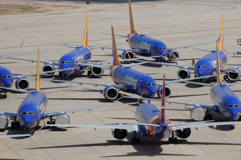 A number of grounded Southwest Airlines Boeing 737 MAX 8 aircraft are shown parked at Victorville Airport in Victorville, California