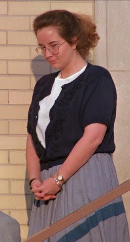 Dave Martin/AP Susan Smith looks toward an unidentified law enforcement officer as she departs the Union County Courthouse in Union, SC., on Friday, July 14, 1995.