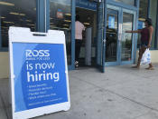 FILE - In this July 8, 2020, file photo, a "Now Hiring" sign sits outside a Ross Dress for Less store, in North Miami Beach, Fla. Unemployment remains painfully high in the U.S. even as economic activity is slowly picking up. That reality will be on display Thursday, July 16, 2020, when the U.S. government releases data on the number of laid off workers seeking unemployment benefits the week prior and retail sales in June. (AP Photo/Wilfredo Lee, File)