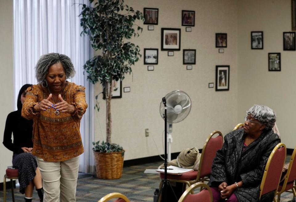 Former Thiokol employee Emma Lou Gibbs, right, listens as Jannie Everette, president and CEO of the Thiokol Memorial Project, speaks during a discussion about the 1971 chemical explosion that killed 29 employees who were mostly women,  during a panel discussion on Wednesday March 29, 2023 at Savannah State University.