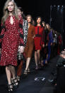 <b>Diane Von Furstenburg AW 13 runway show<br><br></b><br>Cara Delevingne leads the models down the DVF runway at NYFW, showing off bold prints and block colours.<br><br>©Rex<b><br></b>