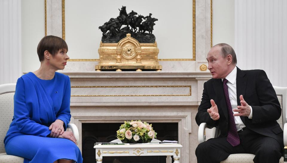 Russian President Vladimir Putin, right, gestures as he speaks to Estonia's President Kersti Kaljulaid at the Kremlin in Moscow, Russia, Thursday, April 18, 2019. Thursday's meeting between the presidents of Russia and Estonia is the first one for the leaders of the two neighbouring countries for nearly a decade. (Alexander Nemenov/Pool Photo via AP)