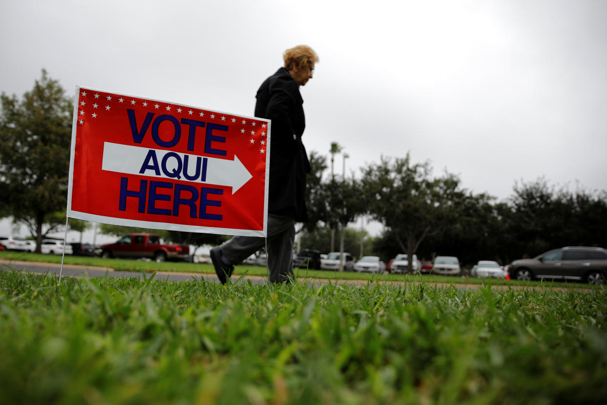 A woman arrives for early voting at a polling station in McAllen, Texas. (Photo: Carlos Barria/Reuters)