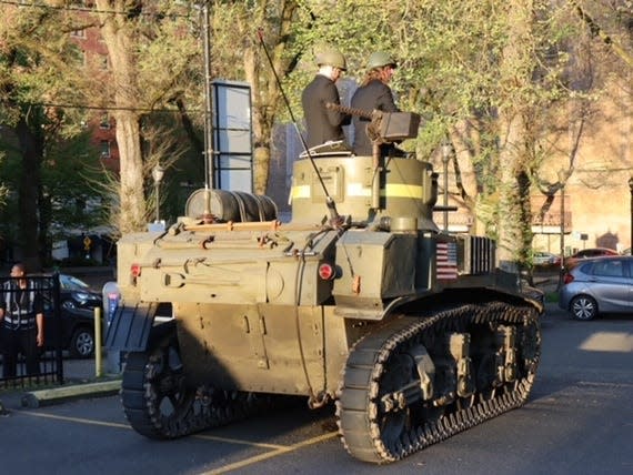 Sam Tetro and Sherman Bynum arrive at prom in a tank