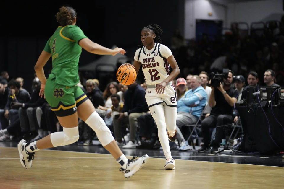 South Carolina guard MiLaysia Fulwiley dribbles down court against Notre Dame during the first half of an NCAA women's college basketball game on Nov. 6, 2023, in Paris. (AP Photo/Thibault Camus)