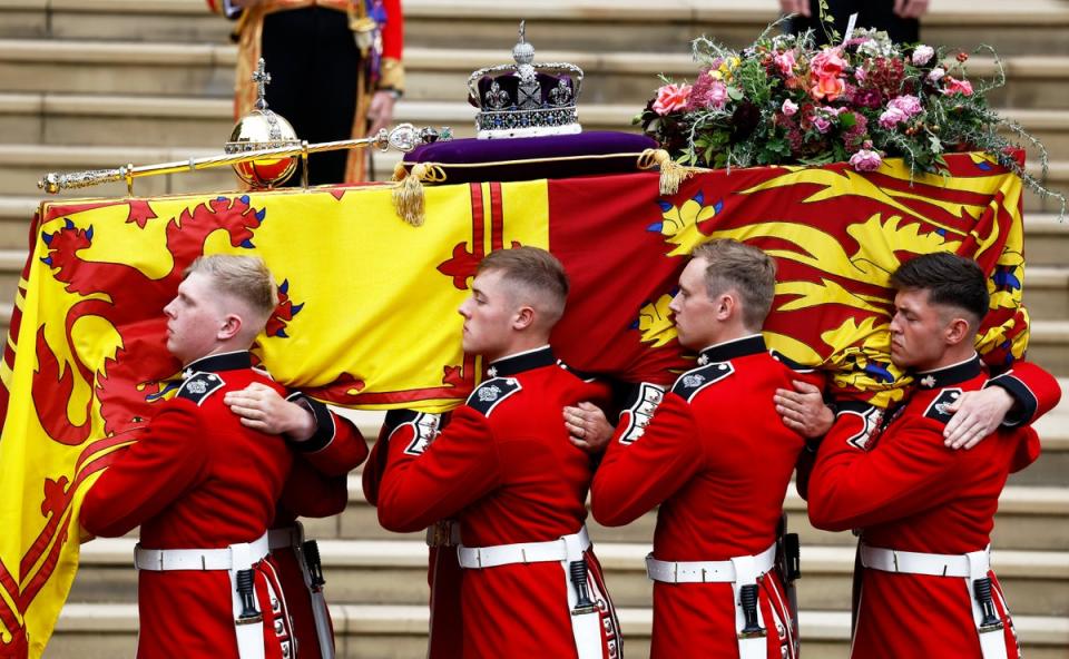 David Sanderson is seen carrying the Queen’s coffin at the front. Pall bearers carry the coffin of Queen Elizabeth II with the Imperial State Crown resting on top to St. George's Chapel (Getty Images)