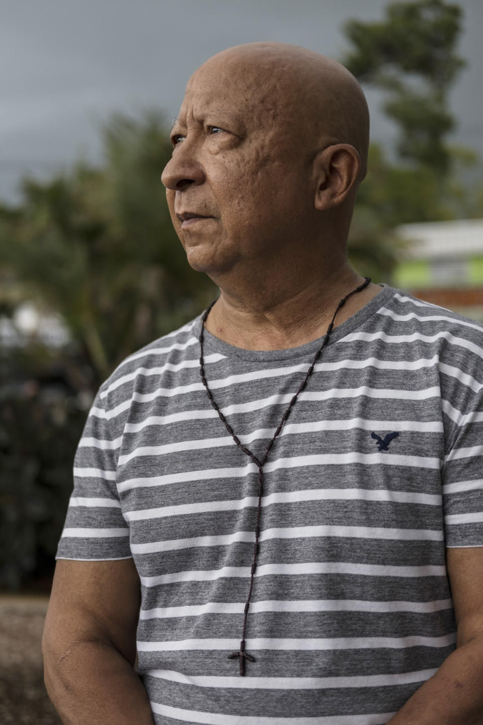 Manases Vega, 65, a retired high school art teacher, poses for a portrait in Salinas. (Photo: Dennis Rivera Pichardo for HuffPost)