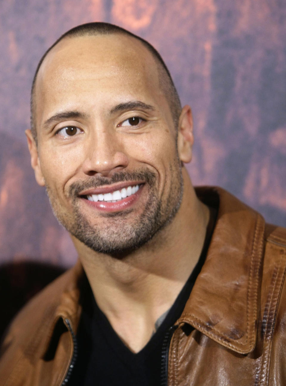 Dwayne Johnson poses during the Spanish premiere of the film Race to Witch Mountain in Madrid