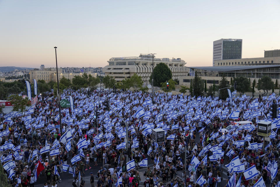 Thousands of Israelis protest against plans by Prime Minister Benjamin Netanyahu's government to overhaul the judicial system, in Jerusalem, Saturday, July 22, 2023. Thousands of demonstrators entered the last leg of a four-day and nearly 70-kilometer (roughly 45-mile) trek from Tel Aviv to Jerusalem. Protest organizers planned to camp overnight outside Israel's parliament on Saturday. (AP Photo/Ohad Zwigenberg)