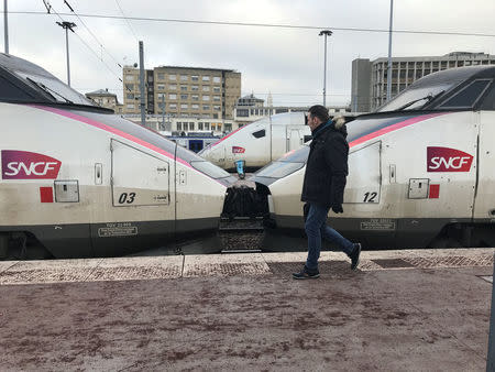 A man walks past TGV high speed trains at the Gare du Nord railway station in Paris, France, March 21, 2018. REUTERS/Pascal Rossignol