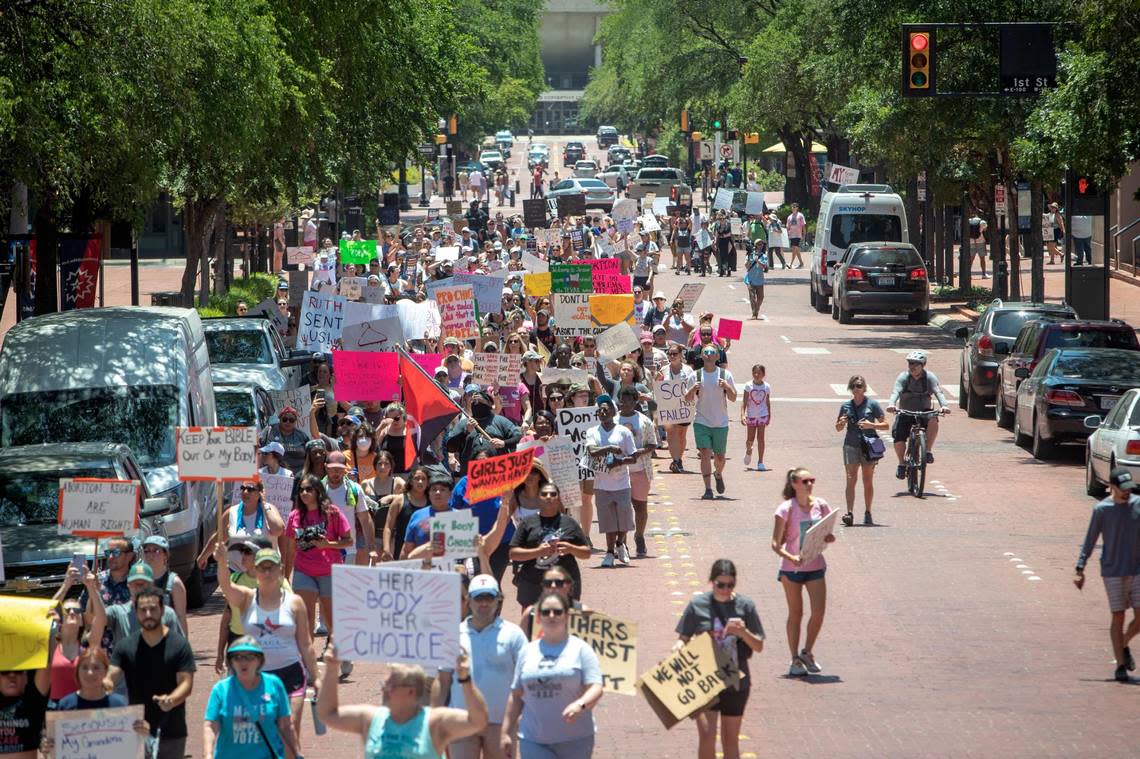 Hundreds of people marched June 25 through downtown Fort Worth in protest of the loss of the federal right to an abortion.
