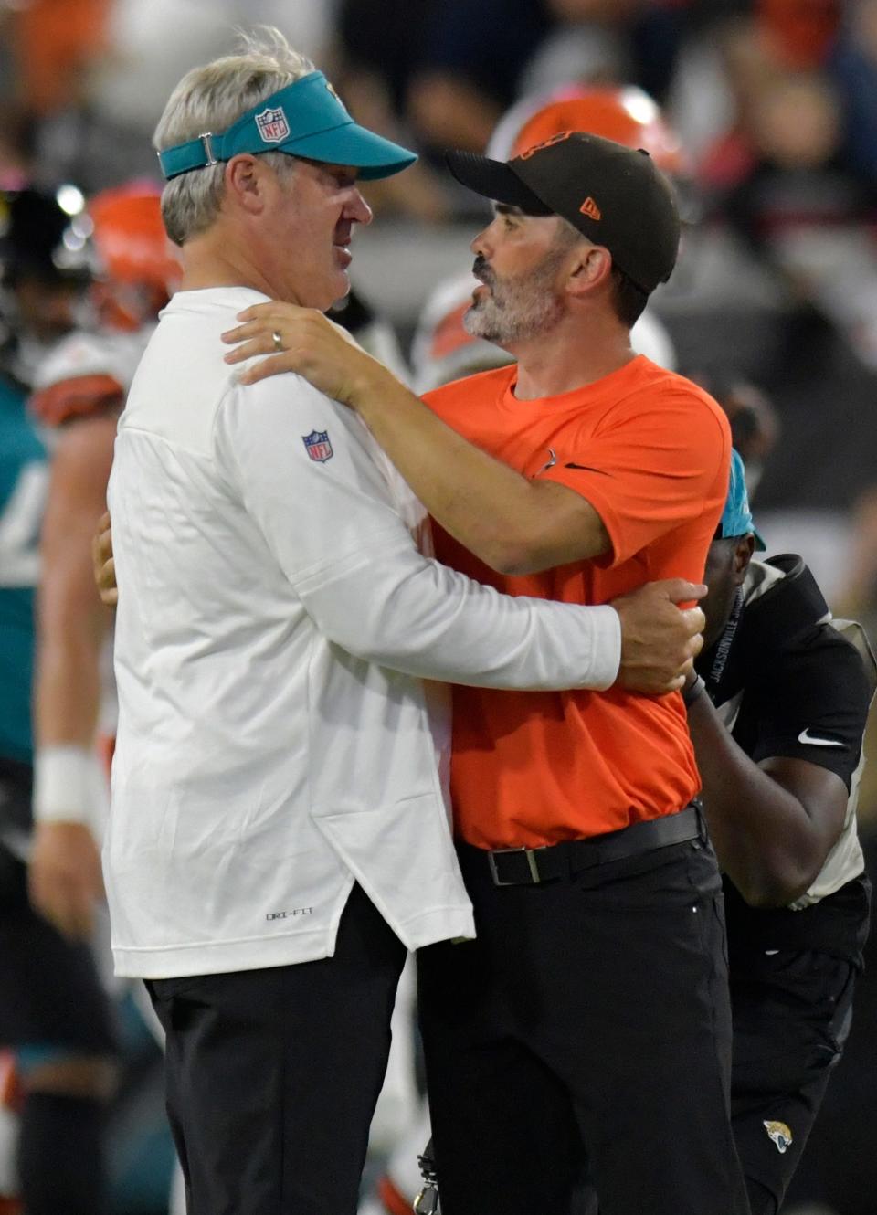 Jacksonville Jaguars head coach Doug Pederson greets Cleveland Browns head coach Kevin Stefanski midfield after the Browns victory in Jacksonville Friday night. Jaguars hosted the Cleveland Browns at TIAA Bank Field in Jacksonville, Florida Friday, August 12, 2022 for the first home preseason game of the season. The Browns won with a final score of 24 to 13. [Bob Self/Florida Times-Union]