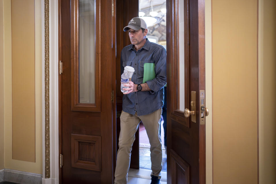 Rep. Garret Graves, R-La., top mediator in the debt limit talks for House Speaker Kevin McCarthy, R-Calif., leaves a meeting room after negotiations came to an abrupt halt, at the Capitol in Washington, Friday, May 19, 2023. Graves told reporters it's time to "press pause" and it's "just not productive" to continue at this point. (AP Photo/J. Scott Applewhite)