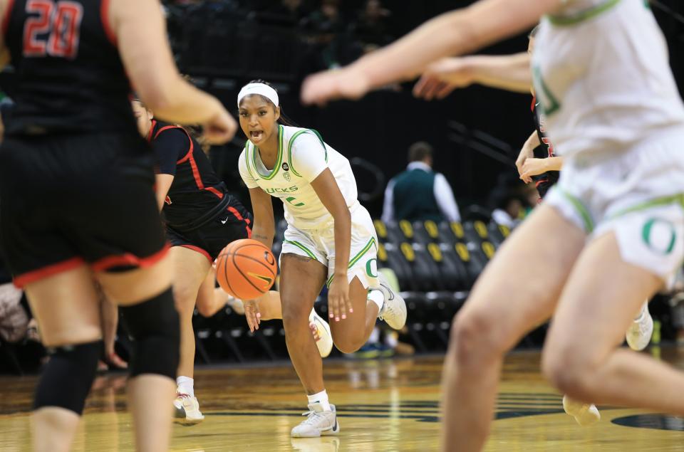 Oregon’s Chance Gray, center, brings the ball down court during the second half of the Duck’s exhibition against Southern Oregon at Matthew Knight Arena Oct 29, 2023 in Eugene, Oregon.