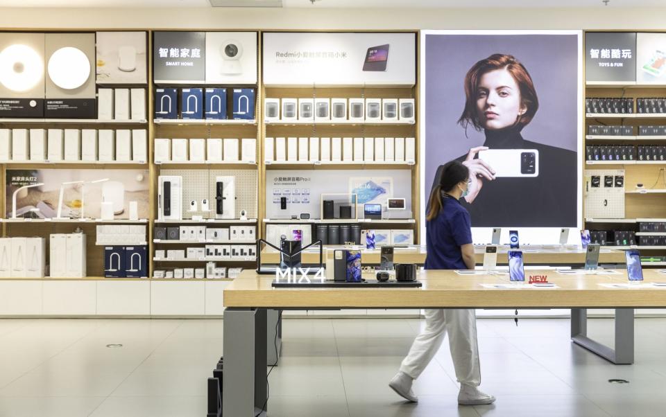 Inside a Xiaomi Corp. store in Shanghai, China, on Tuesday, Aug. 24, 2021 - Qilai Shen/ Bloomberg