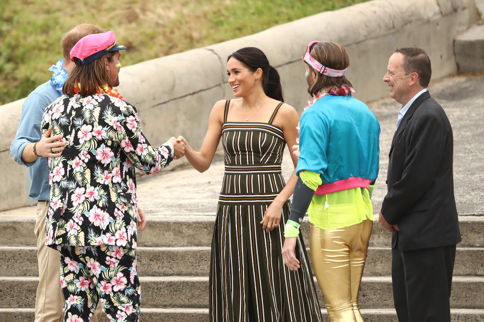 Meghan is wearing a Martin Grant maxi dress. Photo: Getty