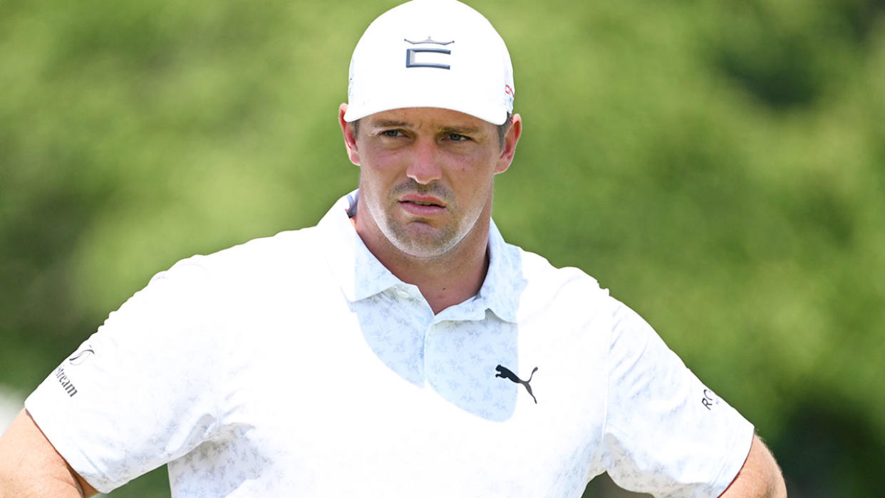 Seen here, Bryson DeChambeau looks on during practice ahead of the US PGA Championship due to a troublesome wrist complaint. 