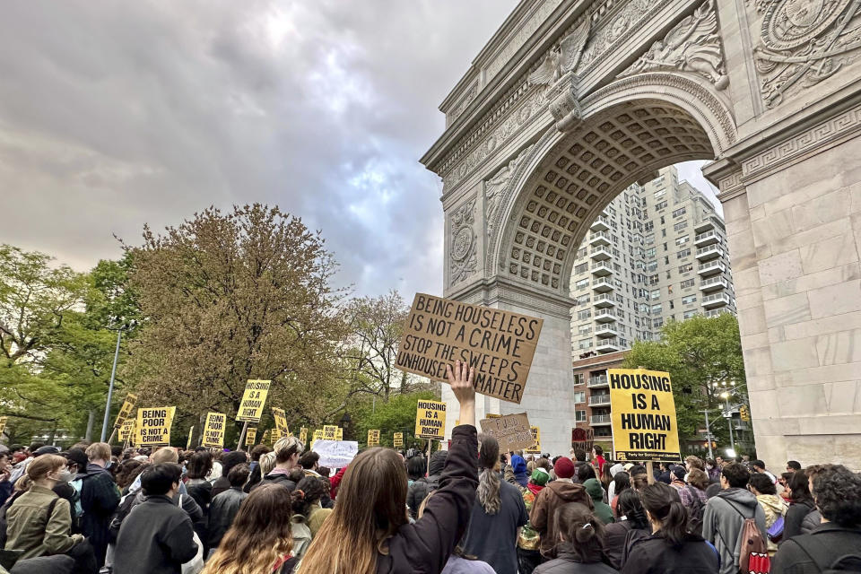 A group of several hundred people protest the death of Jordan Neely, Friday, May 5, 2023, at Washington Square Park in New York. Neely, a locally-known Michael Jackson impersonator who friends say suffered from worsening mental health, died Monday, May 1, when a fellow rider pulled him to the floor and pinned him with a hold taught in Marine combat training. (AP Photo/Brooke Lansdale)