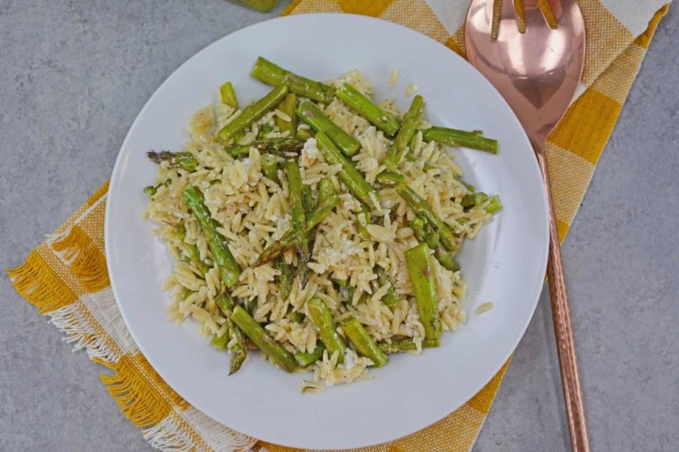 <p>Savory Experiments</p><p>Orzo combines whimsically with tangy goat cheese and tender asparagus in this summer salad. </p><p><strong>Get the recipe: </strong><a href="https://www.savoryexperiments.com/orzo-salad-goat-cheese-asparagus/?fbclid=IwAR1-41Y_0_WFIFDXtuBRfw6m4X2nFG4oCNcOIGprrpbQlOqd7CIvaZIMPkk" rel="nofollow noopener" target="_blank" data-ylk="slk:Goat Cheese and Orzo Salad;elm:context_link;itc:0;sec:content-canvas" class="link "><strong>Goat Cheese and Orzo Salad</strong></a></p>