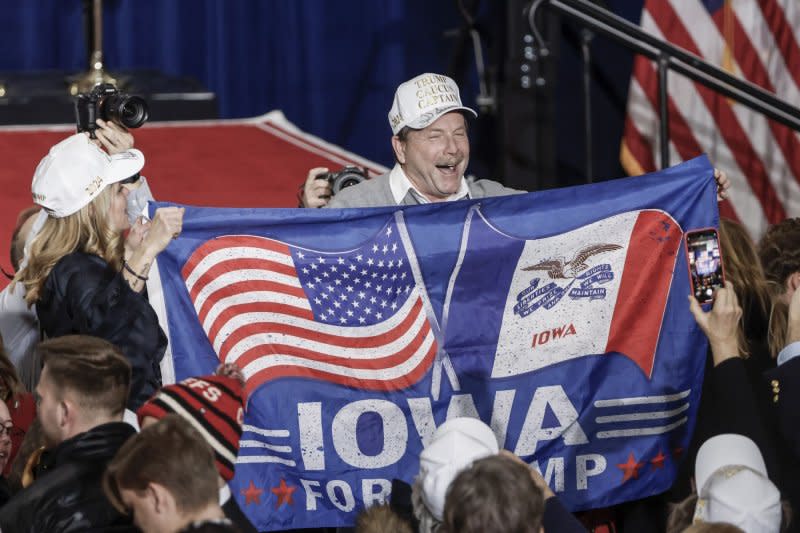 Supporters wait for former President Donald Trump to arrive and celebrates his win in the Iowa Caucus at the Iowa Events Center in Des Moines, Iowa on January 15. Photo by Tannen Maury/UPI