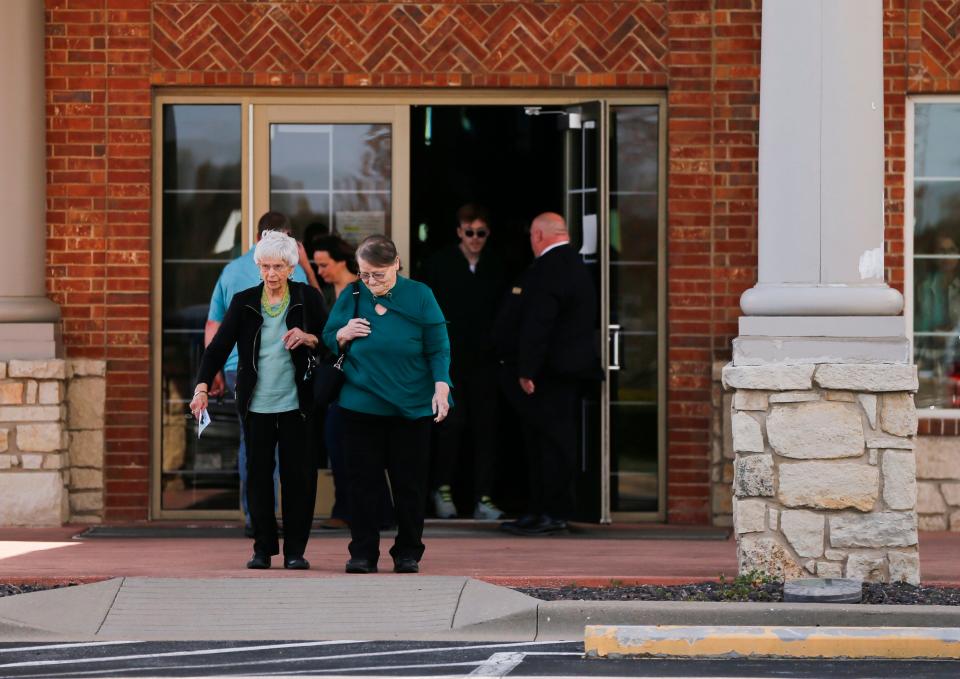 Mourners leave Greenlawn Funeral Home in Springfield, Mo. after a visitation and celebration of life was held for Riley Strain, 22, on Friday, March 29, 2024. Strain's body was found in the Cumberland River after a 2-week search.