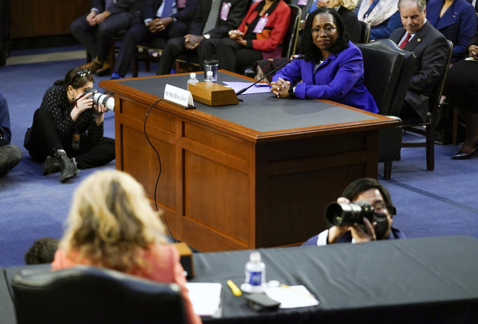 Supreme Court nominee Judge Ketanji Brown Jackson listens to Sen. Marsha Blackburn, R-Tenn., speak during her confirmation hearing before the Senate Judiciary Committee Monday, March 21, 2022, on Capitol Hill in Washington. (AP Photo/Carolyn Kaster)