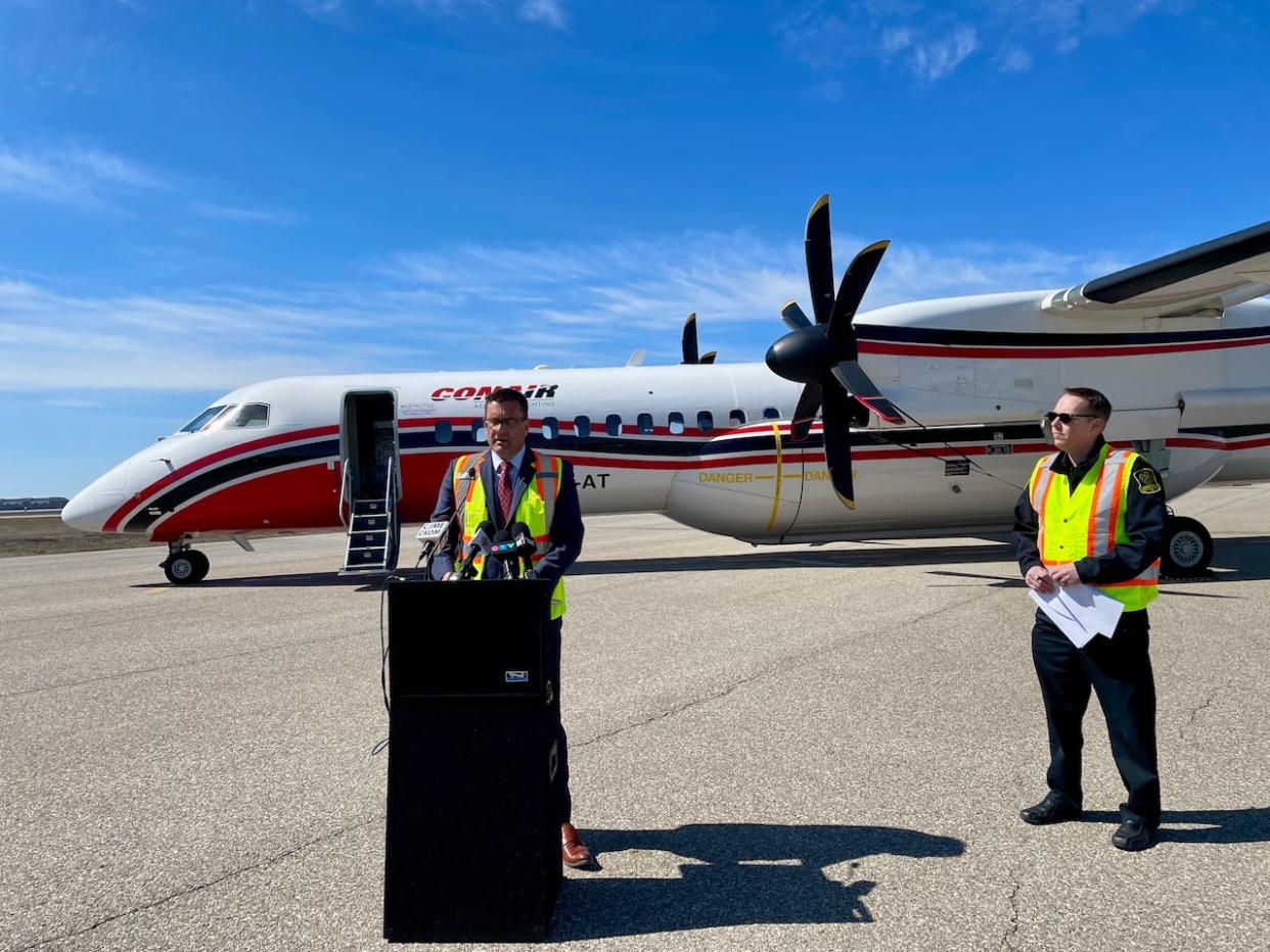 The Saskatchewan government has announced it will renew its fleet of firefighting aircraft by purchasing four repurposed land-based airtanker aircraft. The first of the planes will arrive in 2025.  (Alexander Quon/CBC - image credit)