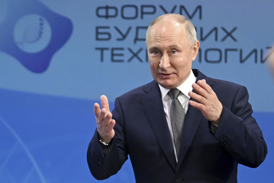 Russian President Vladimir Putin gestures as he speaks to scientists on the sidelines of the Future Technologies Forum at the World Trade Centre in Moscow, Russia, Wednesday, Feb. 14, 2024. (Kristina Kormilitsyna, Sputnik, Kremlin Pool Photo via AP)