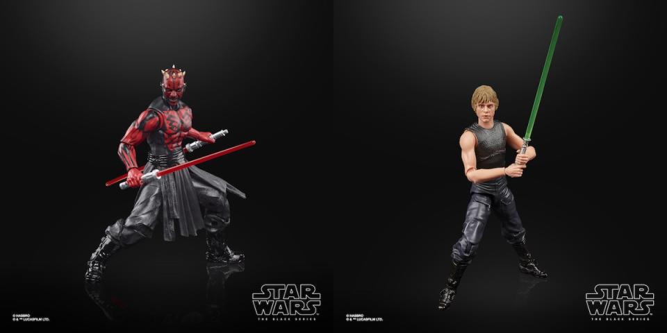 Two Star Wars Hasbro Black Series figures, a shirtless Darth Maul with lightsabers, and Luke Skywalker in black clothes holding a lightsaber