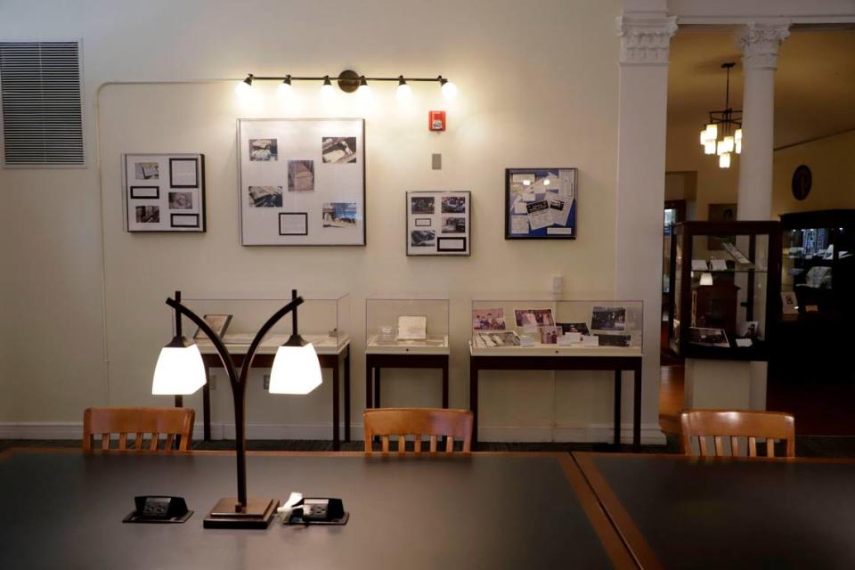 The surviving artifacts from the Mooresville time capsule sit on display at the Mooresville Public Library. Photos and videos are also on display showing the time capsule being put in the ground. Sean McInnis/smcinnis@charlotteobserver.com