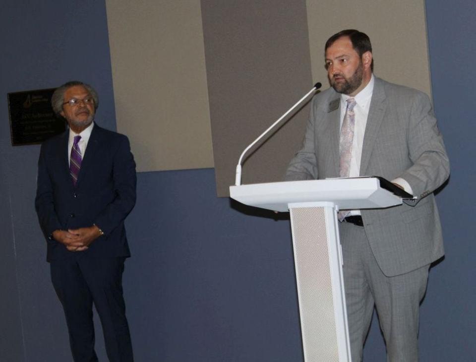 Dr. Gatewood, ACC President listens to Dr. Butler, ABSS Superintendent speak during ACC's press conference (07/14).