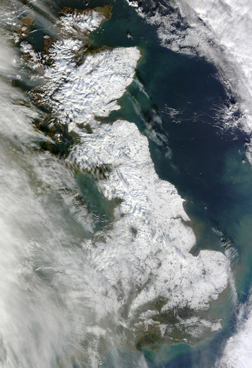 A natural-colour image released by NASA shows a detailed view of the snow covering Britain on January 26 (NASA)