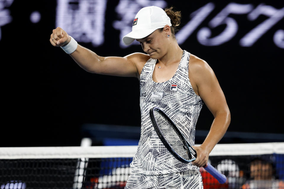 Ash Barty of Australia reacts after defeating Madison Keys of the U.S. in their semifinal match at the Australian Open tennis championships in Melbourne, Australia, Thursday, Jan. 27, 2022. (AP Photo/Hamish Blair)