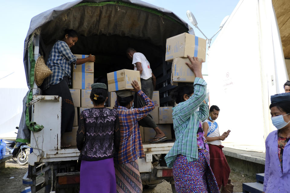 This image provided by World Food Programme shows relief food commodities being stockpiled at WFP warehouses in Rakhine State. Authorities in Bangladesh and Myanmar prepared to evacuate hundreds of thousands of people Friday, warning them to stay away from coastal areas as a severe cyclonic storm churned in the Bay of Bengal. Cyclone Mocha was moving toward the coasts of southeastern Bangladesh and Myanmar with wind speeds of up to 200 kilometers (125 miles) per hour and gusts up to 220 kph (136 mph), the Indian Meteorological Department said. It's projected to make landfall on Sunday evening in an area between between Cox’s Bazar in Bangladesh and Kyaukpyu in Myanmar. (World Food Programme via AP)