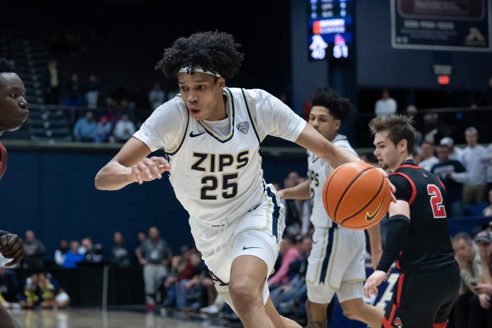 Akron's Enrique Freeman drives to the basket against Ball State on Feb. 28 at Rhodes Arena.