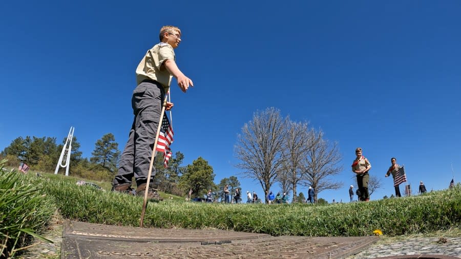 Andrew Randall, a Boy Scout from Troop 66, was the one who found the special gravestone they were looking for.