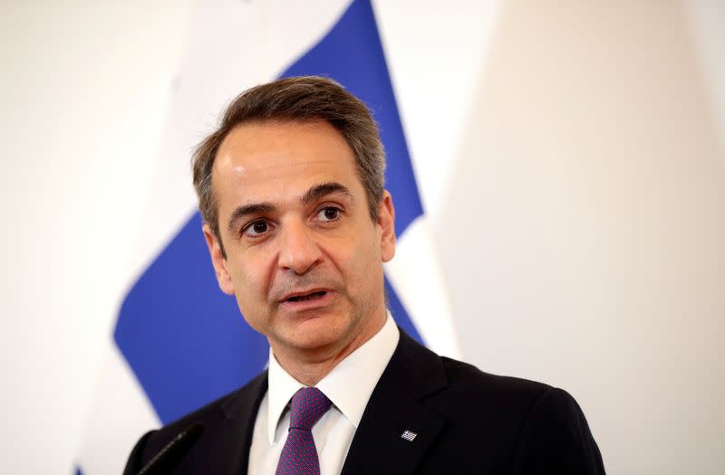 FILE PHOTO: Greek Prime Minister Kyriakos Mitsotakis and Austrian Chancellor Sebastian Kurz hold a joint news conference in Vienna