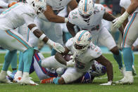 Miami Dolphins cornerback Xavien Howard (25) intercepts a pass intended for Buffalo Bills wide receiver Stefon Diggs (14) during the first half of an NFL football game, Sunday, Sept. 19, 2021, in Miami Gardens, Fla. (AP Photo/Hans Deryk)