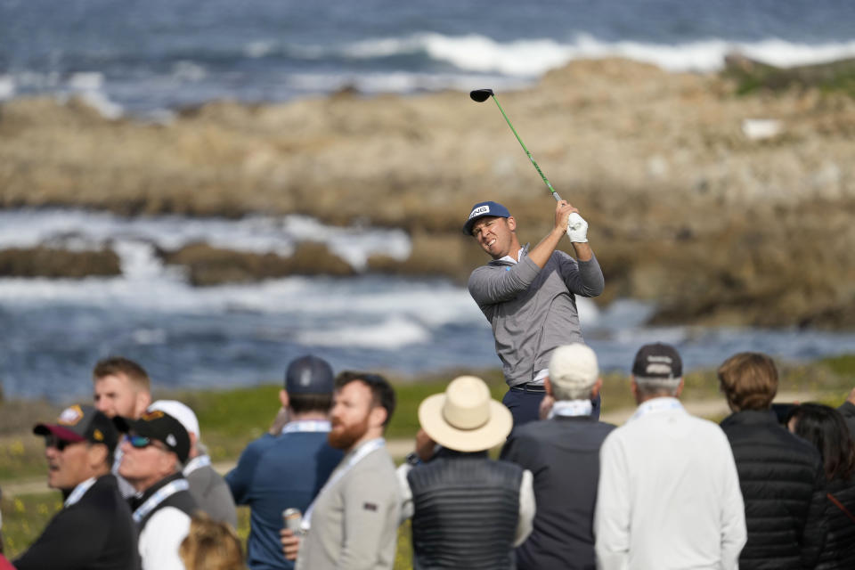 Seamus Power, of Ireland, hits from the 13th tee of the Monterey Peninsula Country Club Shore Course during the third round of the AT&T Pebble Beach Pro-Am golf tournament in Pebble Beach, Calif., Saturday, Feb. 5, 2022. (AP Photo/Tony Avelar)
