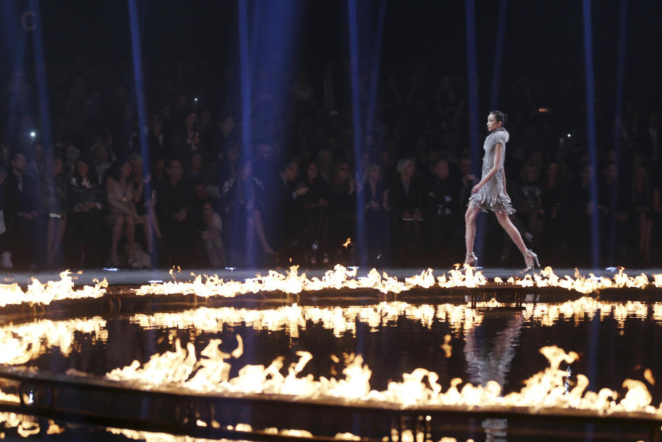 A model wears a creation for Roberto Cavalli women's Fall-Winter 2014-15 collection, part of the Milan Fashion Week, unveiled in Milan, Italy, Saturday, Feb. 22, 2014. (AP Photo/Antonio Calanni)