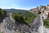 <p>Cyclists speed around a curve in Caltagirone, Italy during the 198-kilometre-long fourth stage of the Giro d’Italia bicycle tour on May 8, 2018. (Photo from Tim de Waele/Getty Images) </p>