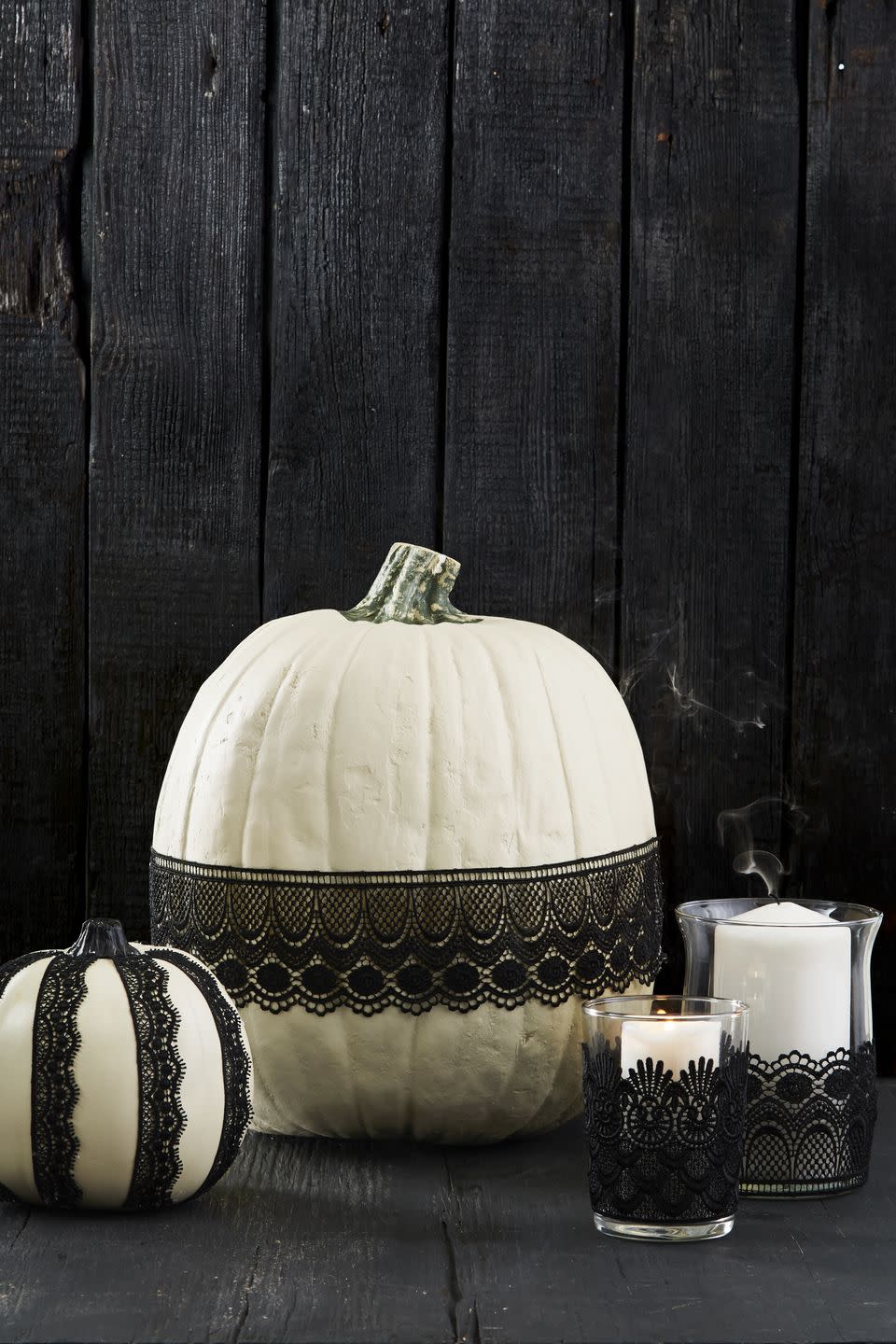 <p>Choose ribbon or lace, then attach to pumpkins, candle holders, or even wine glasses with a few swipes of <a href="https://www.amazon.com/Mod-Podge-Waterbase-16-Ounce-CS11302/dp/B001IKES5O?tag=syn-yahoo-20&ascsubtag=%5Bartid%7C10055.g.1714%5Bsrc%7Cyahoo-us" rel="nofollow noopener" target="_blank" data-ylk="slk:Mod Podge;elm:context_link;itc:0;sec:content-canvas" class="link ">Mod Podge</a>. Let dry, then display. Done!</p><p><a class="link " href="https://www.amazon.com/ATRibbons-Delicate-Eyelash-Decoration-Ornament/dp/B07TLDTNP1/?tag=syn-yahoo-20&ascsubtag=%5Bartid%7C10055.g.1714%5Bsrc%7Cyahoo-us" rel="nofollow noopener" target="_blank" data-ylk="slk:SHOP LACE;elm:context_link;itc:0;sec:content-canvas">SHOP LACE</a><br></p>