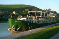 <p>Whether you're looking for a cruise or a cozy, floating B&B, the <a href="https://www.tripadvisor.com/Hotel_Review-g188671-d12146988-Reviews-Barge_Johanna_B_B_and_Cruises-Bruges_West_Flanders_Province.html" rel="nofollow noopener" target="_blank" data-ylk="slk:Barge Johanna;elm:context_link;itc:0;sec:content-canvas" class="link ">Barge Johanna</a> is a totally original way to explore the beauty of France. For half the year, Johanna embarks on chartered cruises through the Champagne region until the vessel is moored in Bruges, Belgium for the winter. Three comfy double cabins means the whole family can come along for the voyage.<br></p>