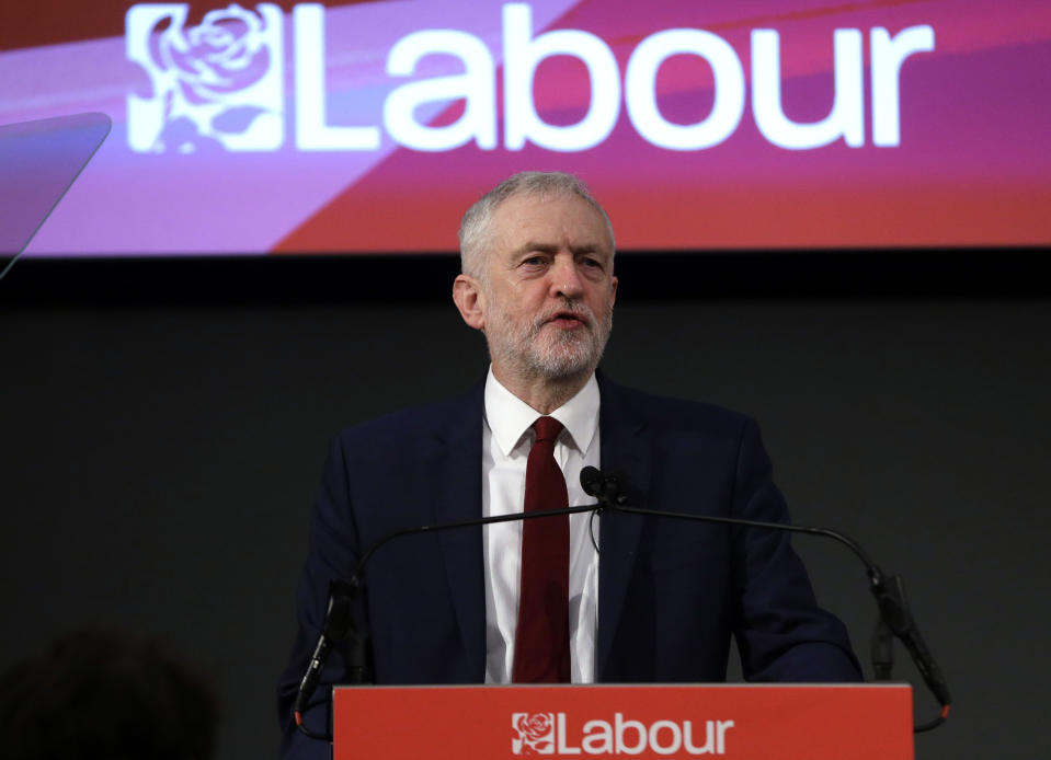 FILE - In this file photo dated Friday, Feb. 24, 2017, leader of Britain's opposition Labour Party Jeremy Corbyn delivers a speech in London. Britain's Labour Party said Tuesday Nov. 12, 2019, it has experienced a "sophisticated and large scale cyberattack" on its digital platforms, also stating that the attack was not successful and the party is confident that no data breach occurred. (AP Photo/Alastair Grant, FILE)